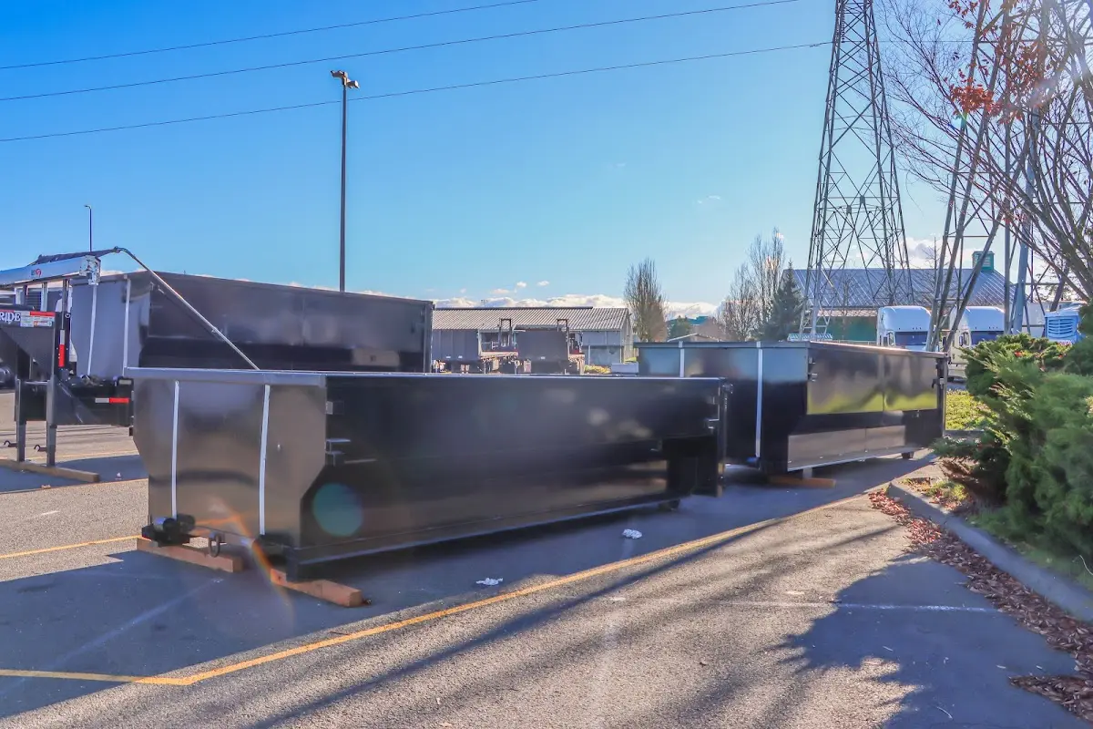 Roll-off dumpster ready for waste disposal at job site for Construction Dumpster Rental in Belfast